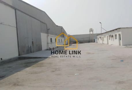 BIG STORE WITH WORKERS HOUSING IN INDUSTRIAL AREA