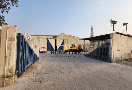 BIG STORE WITH WORKERS HOUSING IN INDUSTRIAL AREA