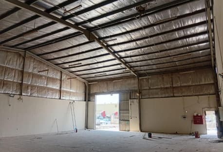A warehouse with attached labor accommodation