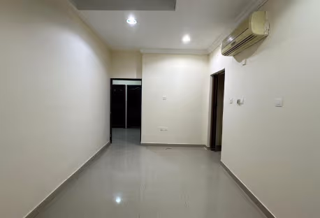 A room and a lounge with a kitchen and a comprehen