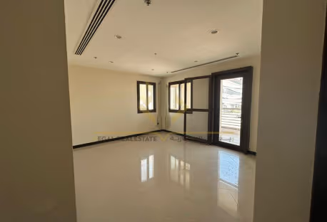 Semi-Furnished 2-Bedroom Apartment with Balcony