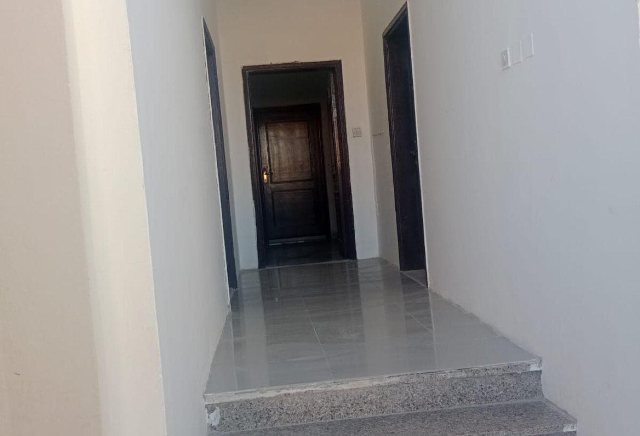 Al Kharaitiyat room with kitchen and bathroom