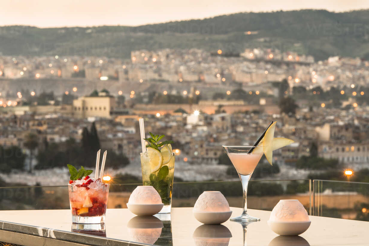 Drink Cocktail on a Rooftop Terrace